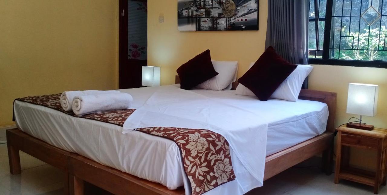 Rindu Homestay Undisan Buitenkant foto